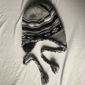 Grey purple and white beanie with braided strings